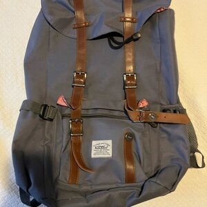 Classic Gray Backpack with Brown Accents